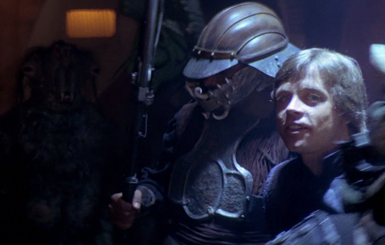 Tanus Spijek (left) watched Luke Skywalker sentenced to death.