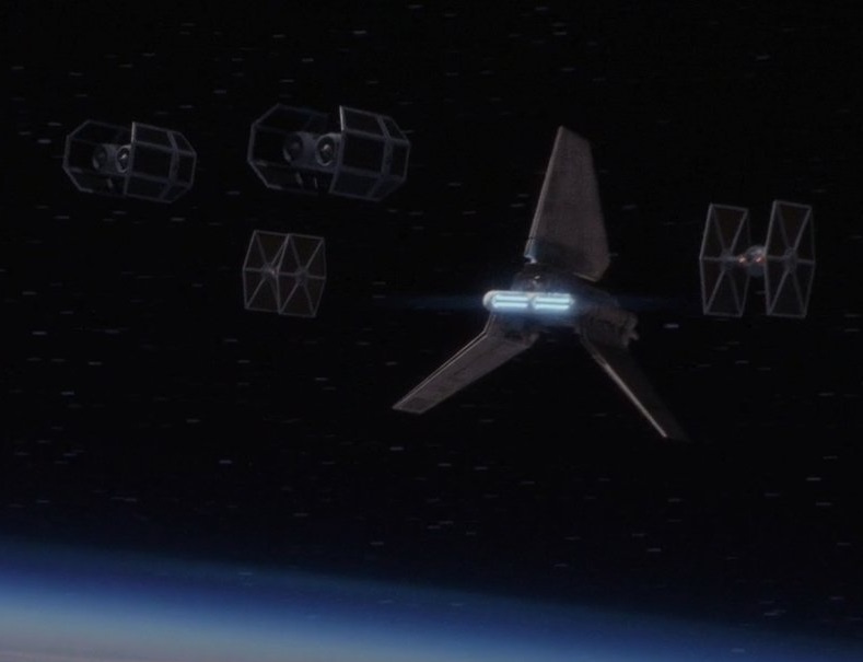 Two TIE Boarding Craft and two TIE/ln space superiority starfighters escorting Darth Vader's Lambda-class T-4a shuttle