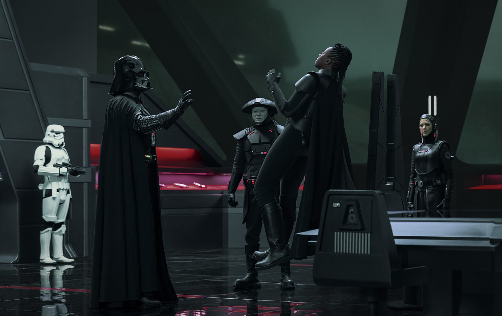 Following her apparent failure, Darth Vader angrily subdues the Third Sister.