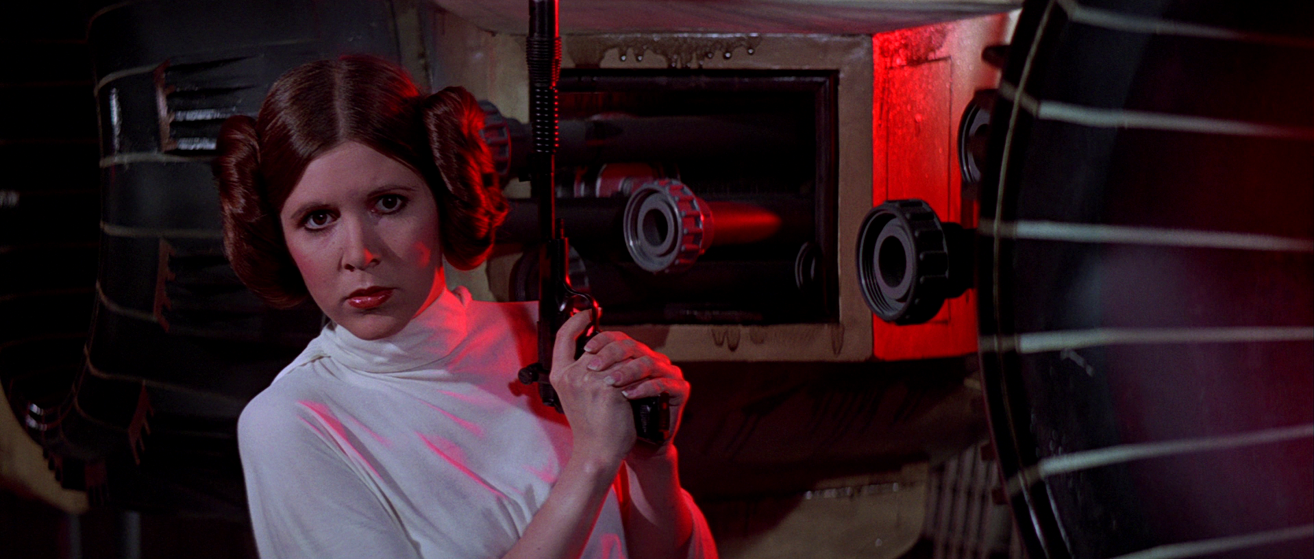 Leia protects herself with a Defender sporting blaster.