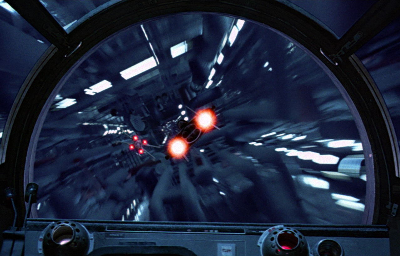 An A-wing escorts the Millennium Falcon down the Death Star II's reactor shaft