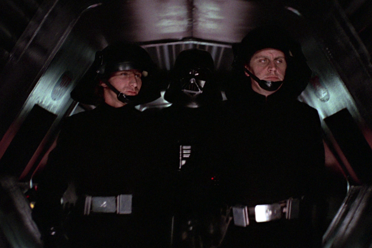 Enfield and Grenwick accompany Vader to interrogate Leia