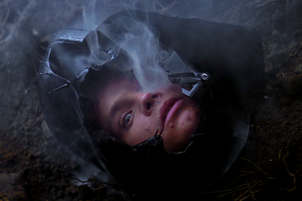 Luke Skywalker faces Darth Vader in the Cave, only to find his own face beneath the Dark Lord's mask.