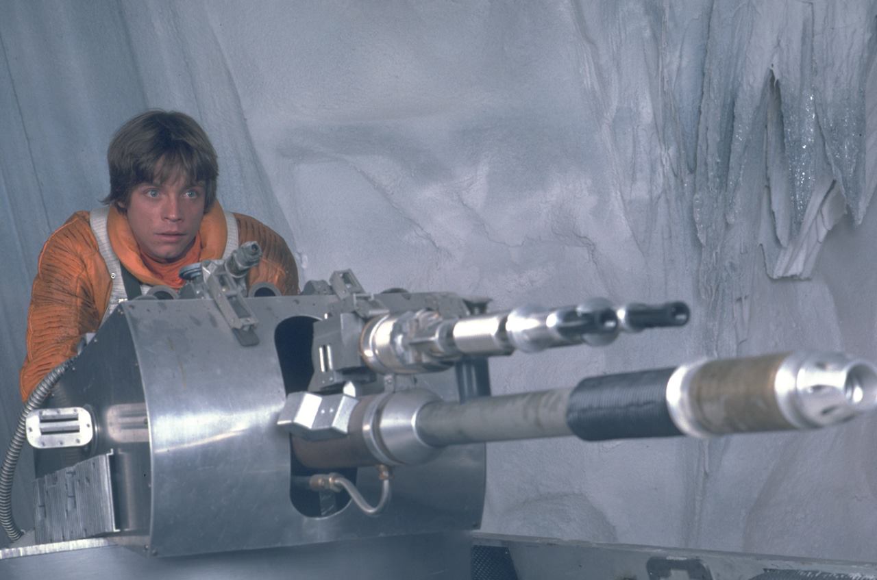 Luke Skywalker mans a heavy artillery weapon against the attacking wampas.