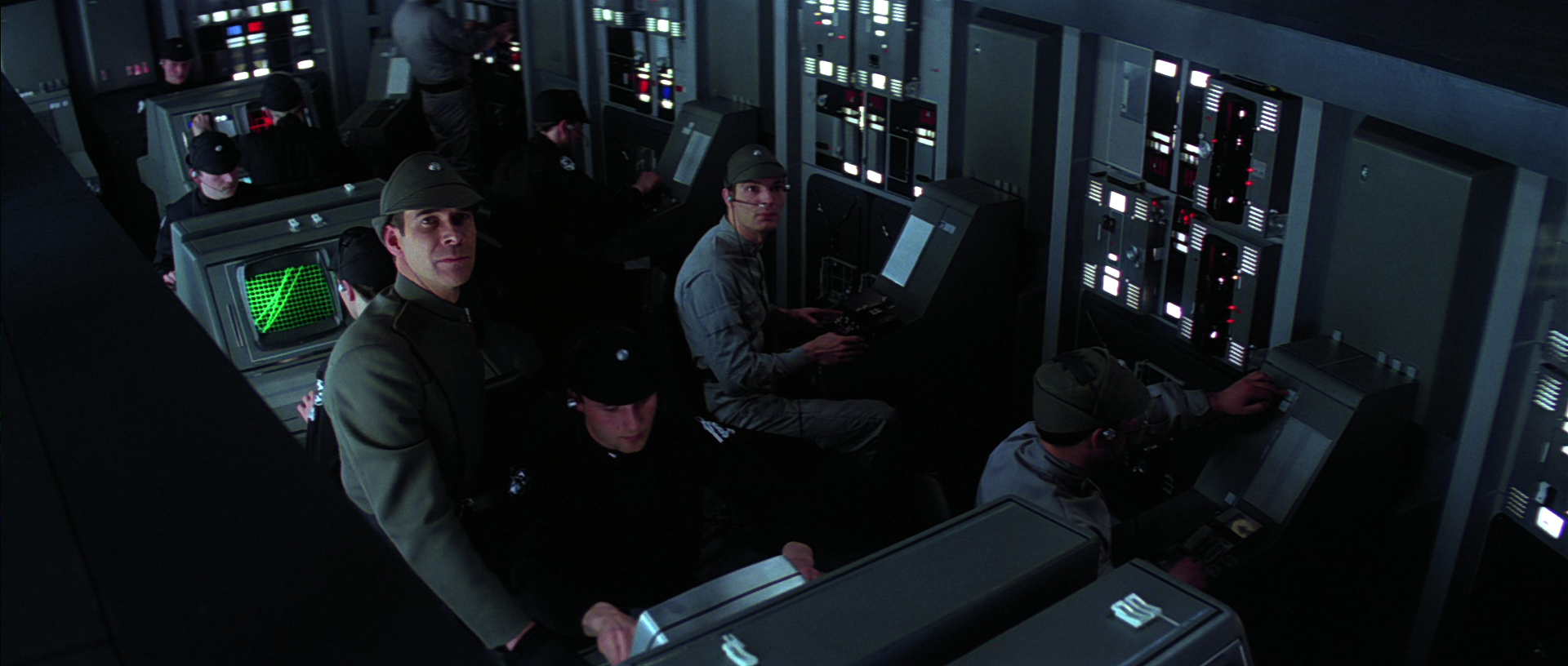 M'Kae relays Vader's communications to Captain Needa.