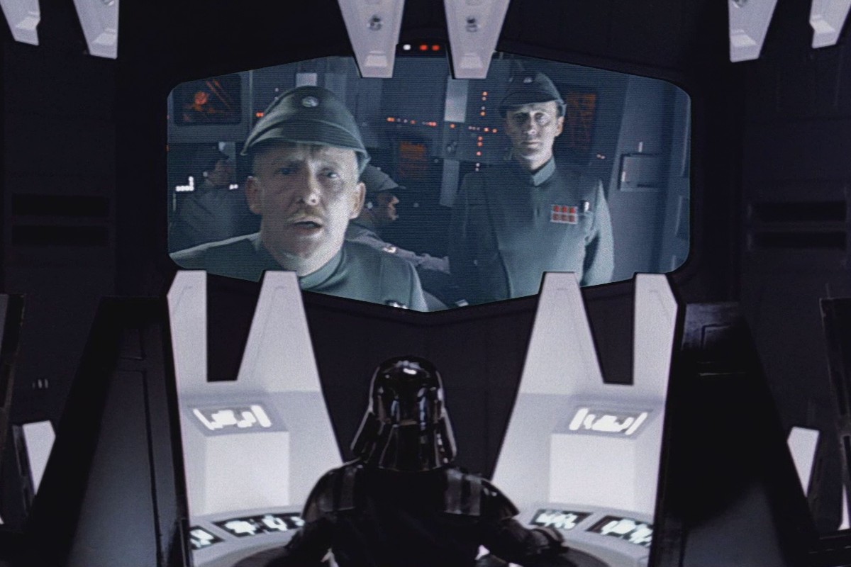 Vader communicates with the bridge of Executor from his meditation chamber.