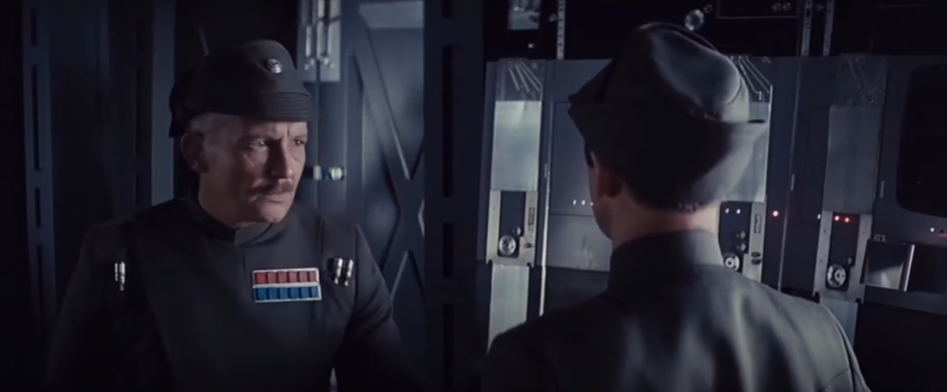 Ozzel silently reprimanding Piett for embarrassing him in front of Darth Vader.