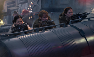 Kin takes cover on the hull of the Steadfast alongside Rose Tico and Kaydel Ko Connix.