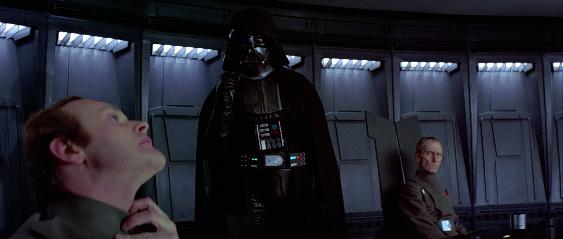 Vader Force chokes Motti for his lack of faith.