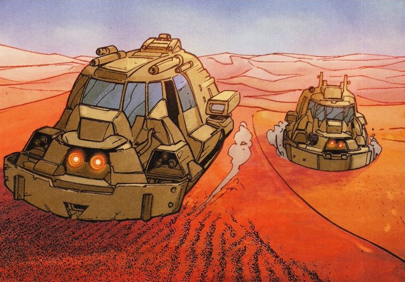 Two landspeeders in the planet's red dunes