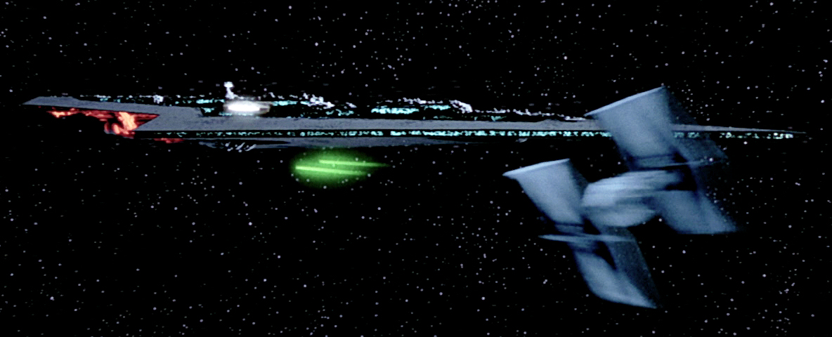 The Millennium Falcon escaping its TIE fighter pursuers