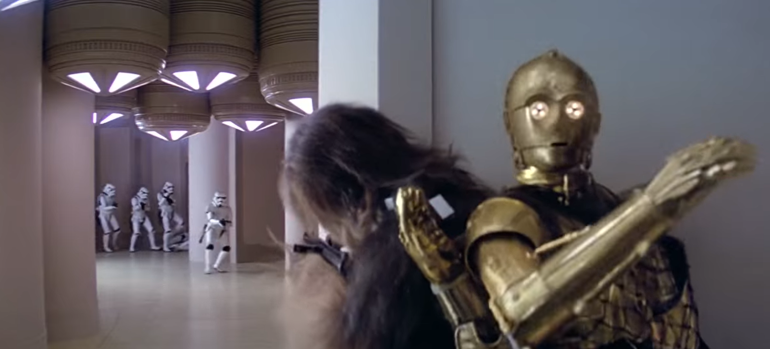 Chewbacca exchanges fire with stormtroopers