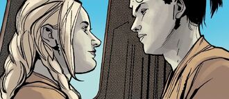 Close-up of two people in facing each other on a sunny day inside the Jedi Temple.