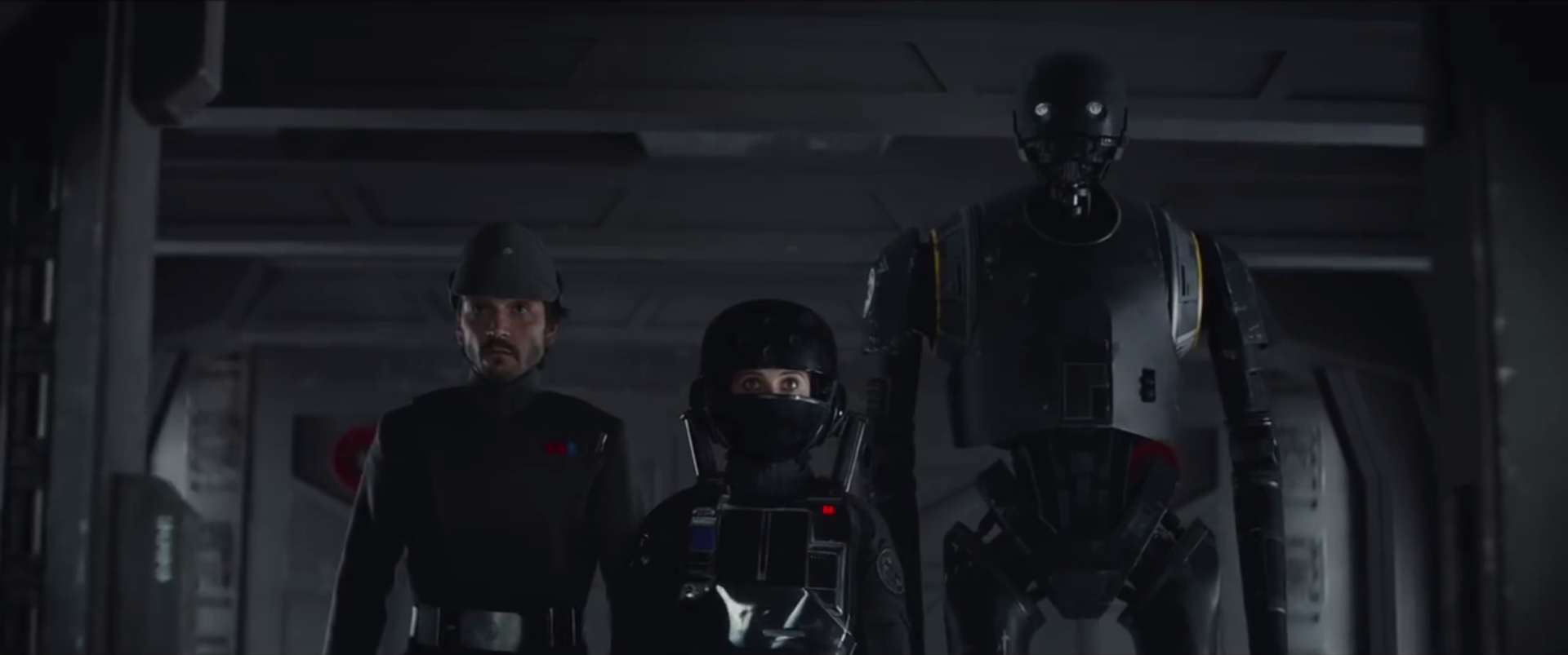 Cassian Andor, Jyn Erso and K-2SO infiltrating the military complex on Scarif