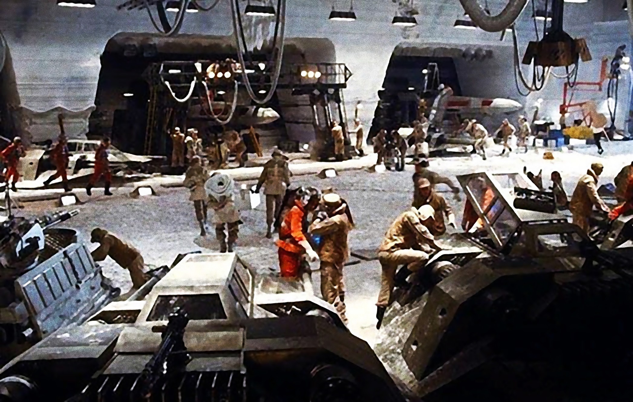 An ice-cutter (left) in the hangar of Echo Base.