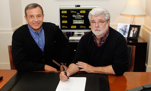 George Lucas and Bob Iger finalizing the deal to sell Lucasfilm to Disney in October 2012.