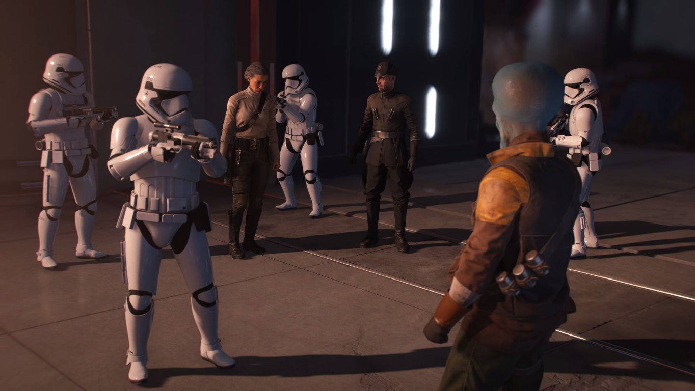 Shriv Suurgav and Iden Versio are surrounded by stormtroopers.