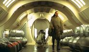 Qui-Gon in his farmer disguise onboard the royal starship