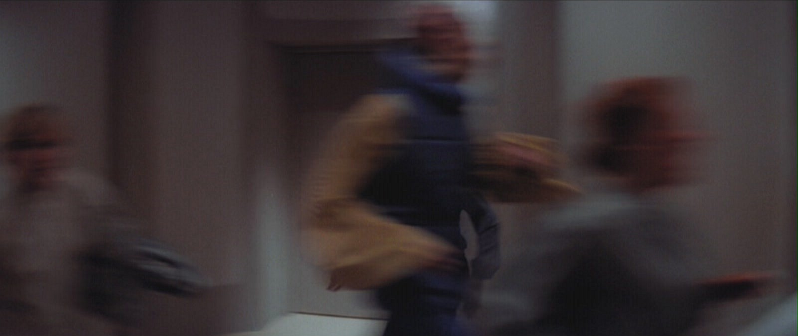 Horme running past Lando Calrissian during the evacuation of Cloud City