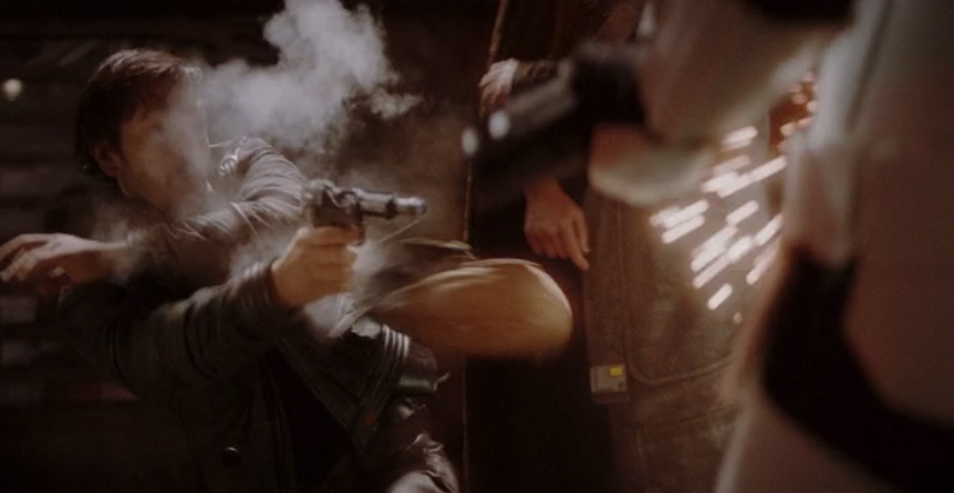 Cassian's concealed blaster.