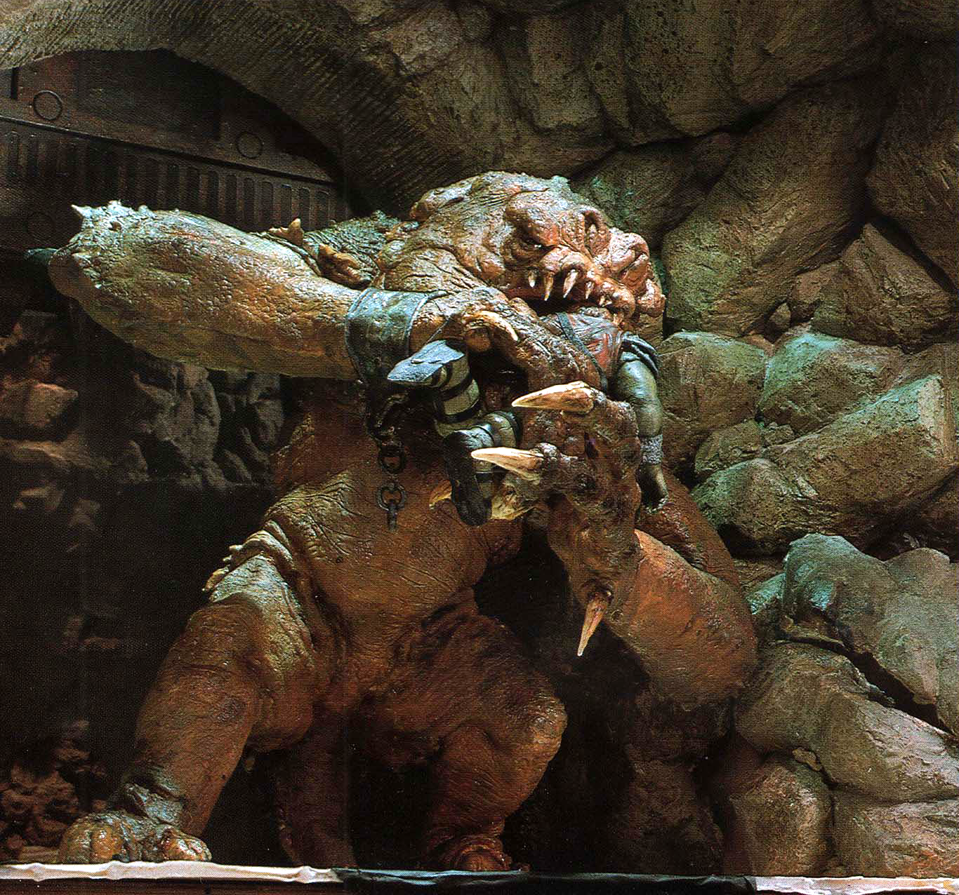 Jabba's rancor devouring the Gamorrean guard, Jubnuk.