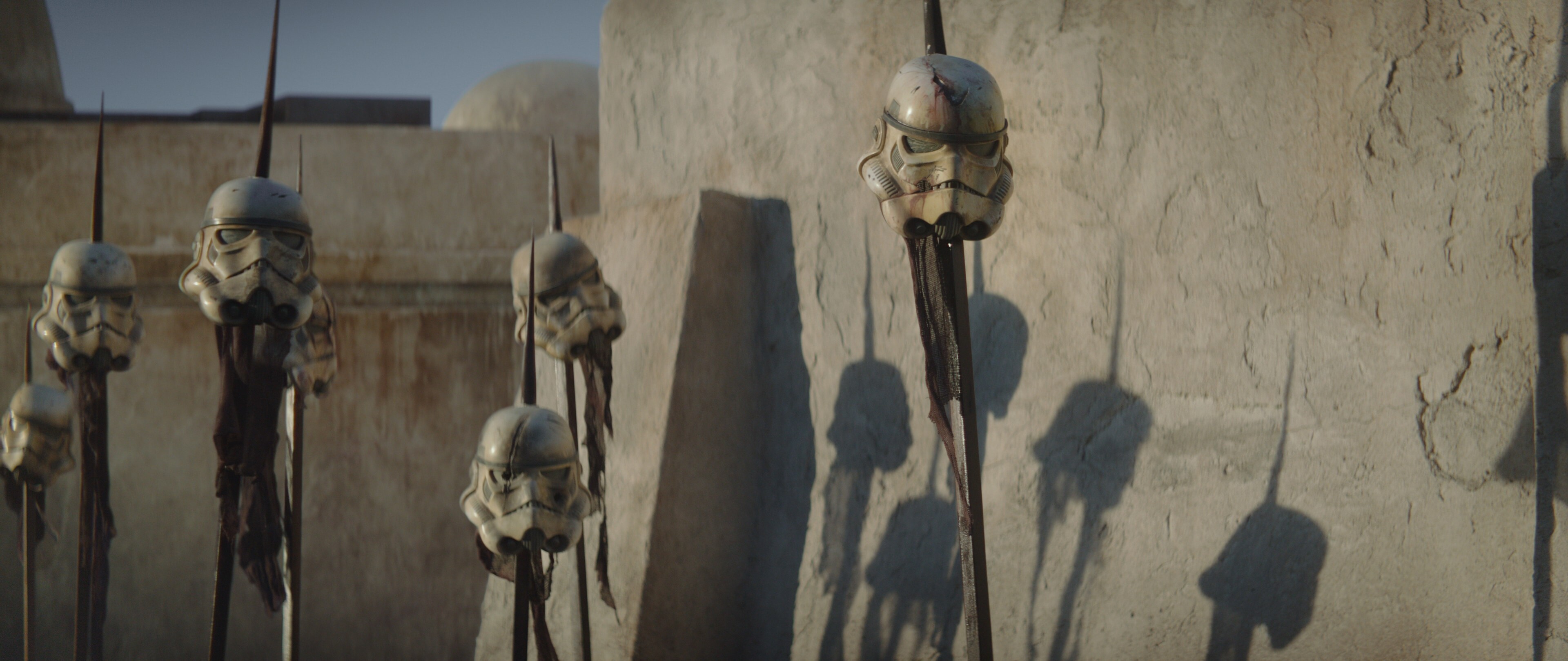 Stormtrooper helmets on pikes in Mos Eisley.