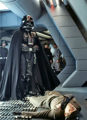 Imperial Navy troopers watch as Darth Vader kills Lorth Needa.