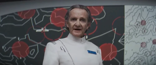 Partagaz-stands-in-front-of-map