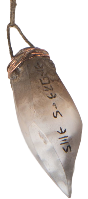An uncolored spintiri crystal used as the pendant of a necklace