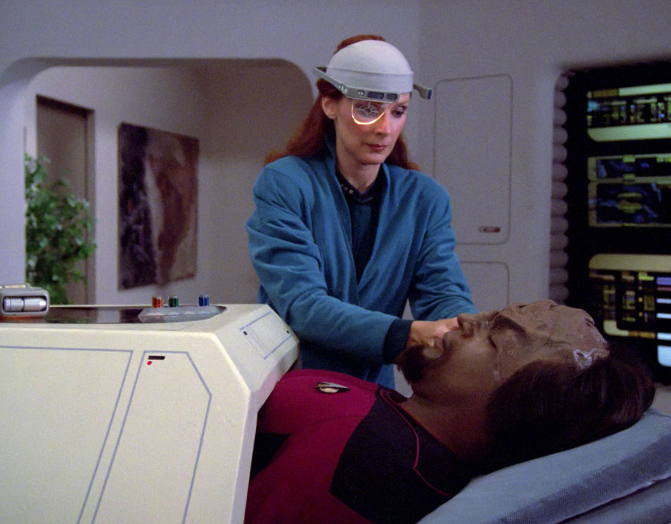 Dr. Beverly Crusher operates in sick bay in an episode of Star Trek: The Next Generation.