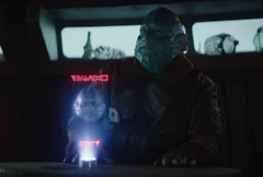 The Mandalorian shows the Mythrol his puck