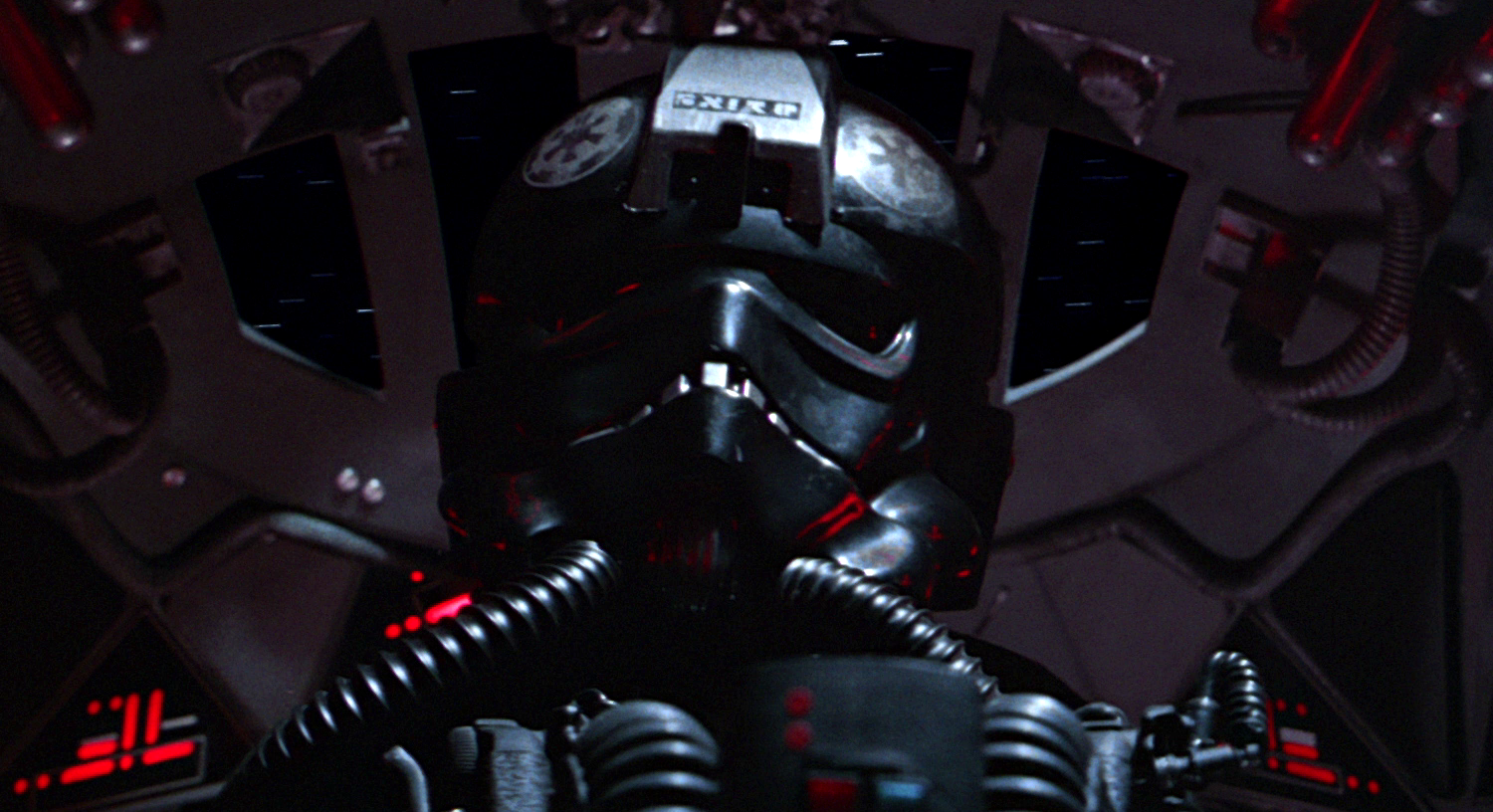 A TIE pilot in the cockpit of a TIE/LN starfighter