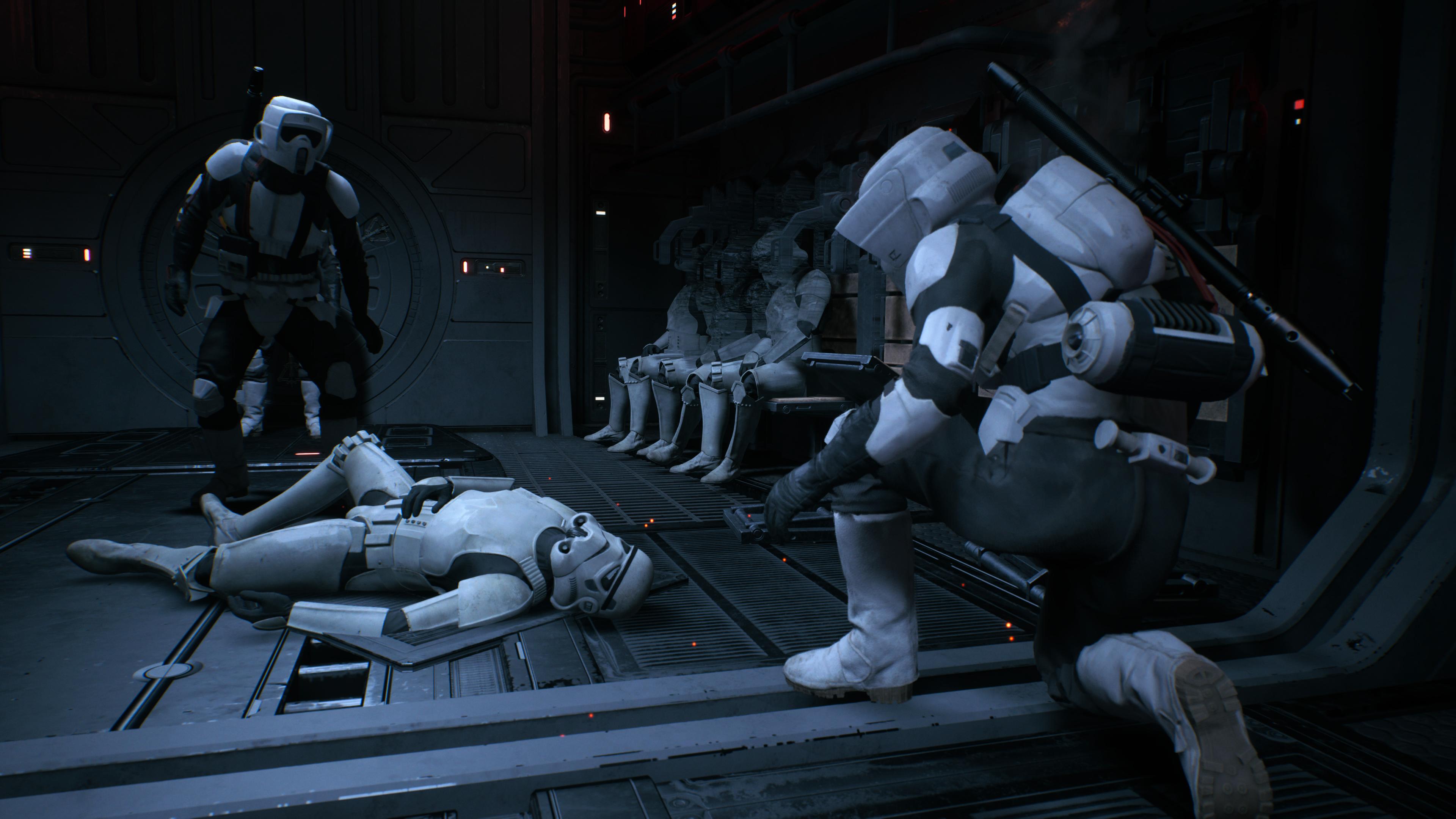 L9-7240 checked the pulse of a fallen stormtrooper after the walker carrying them was struck by a TIE fighter.