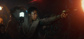 Lit by a glowlamp, Snee fires onehanded in the direction of the Yavinian doodar on Yavin 4.