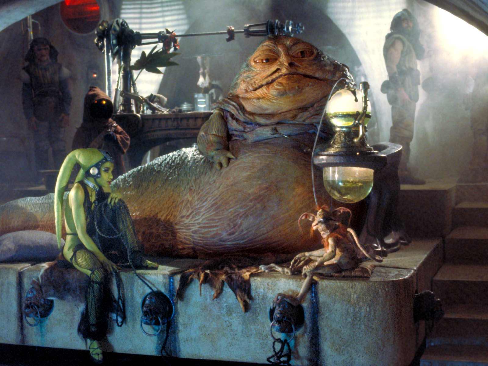 Jabba the Hutt reclines with his slave girl Oola.