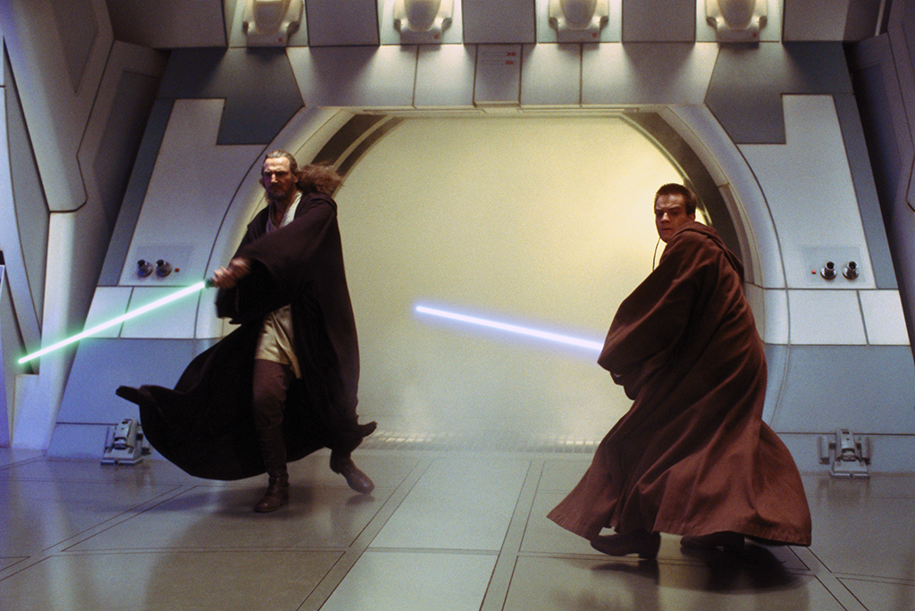 Qui-Gon Jinn and Obi-Wan Kenobi escape from the dioxis-filled meeting chamber.