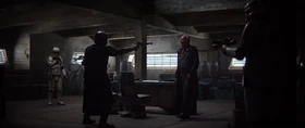 The Mandalorian in a standoff