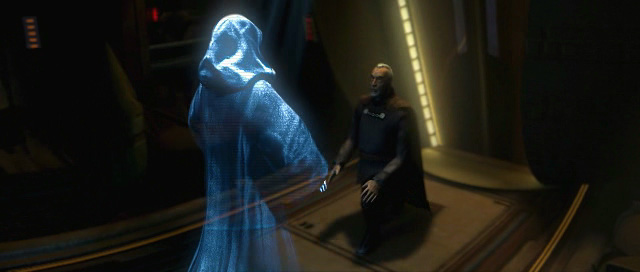 Darth Tyranus communicates with Darth Sidious, discussing their plot to find a host for the clone army.