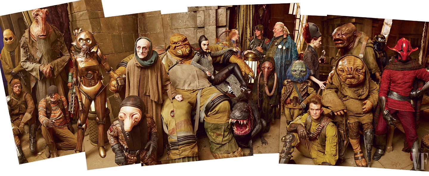 A behind the scenes photo by Annie Leibovitz of a group of characters in the castle.