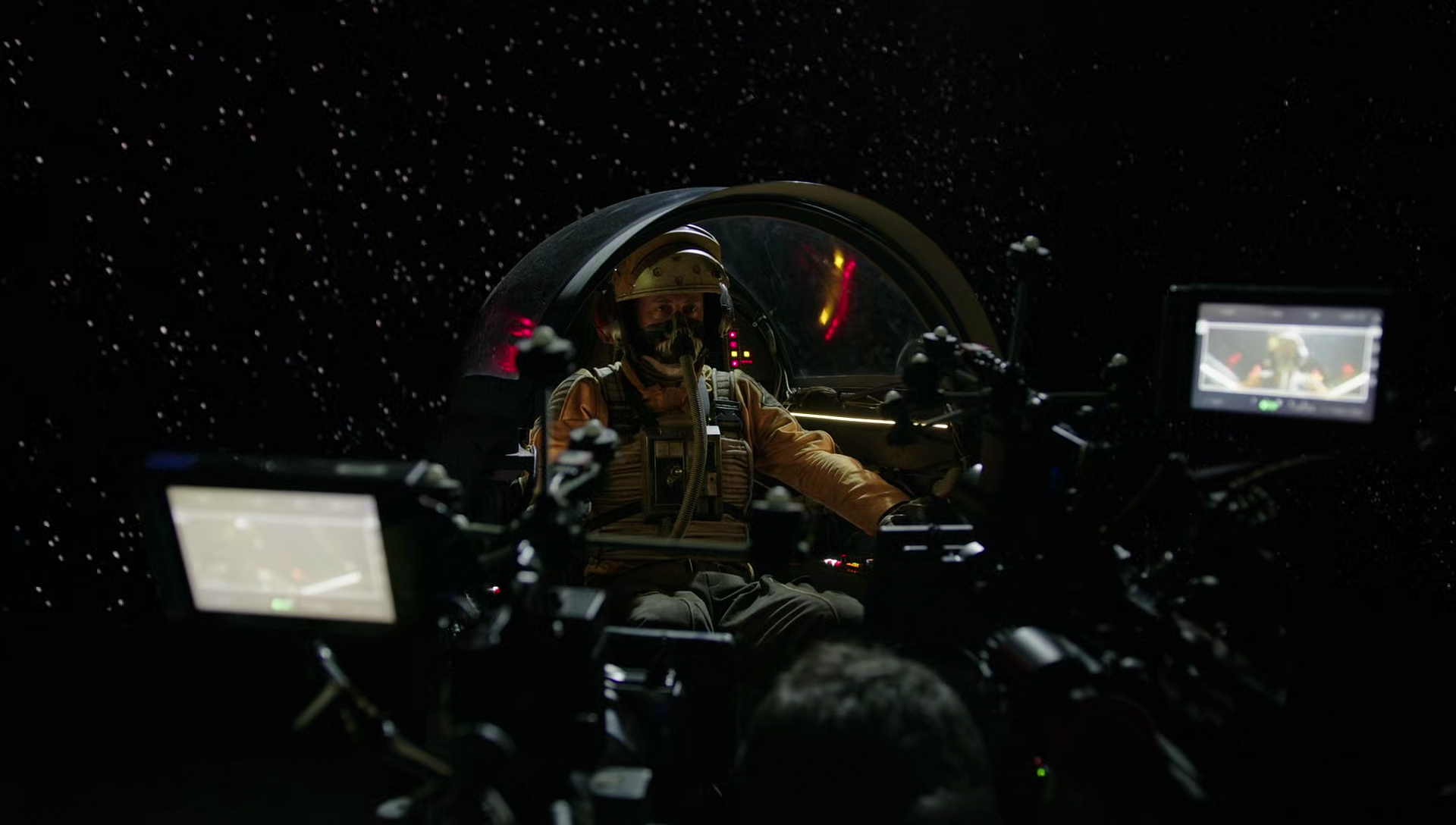 Rio Hackford filming in the cockpit of Riot Mar's starfighter.