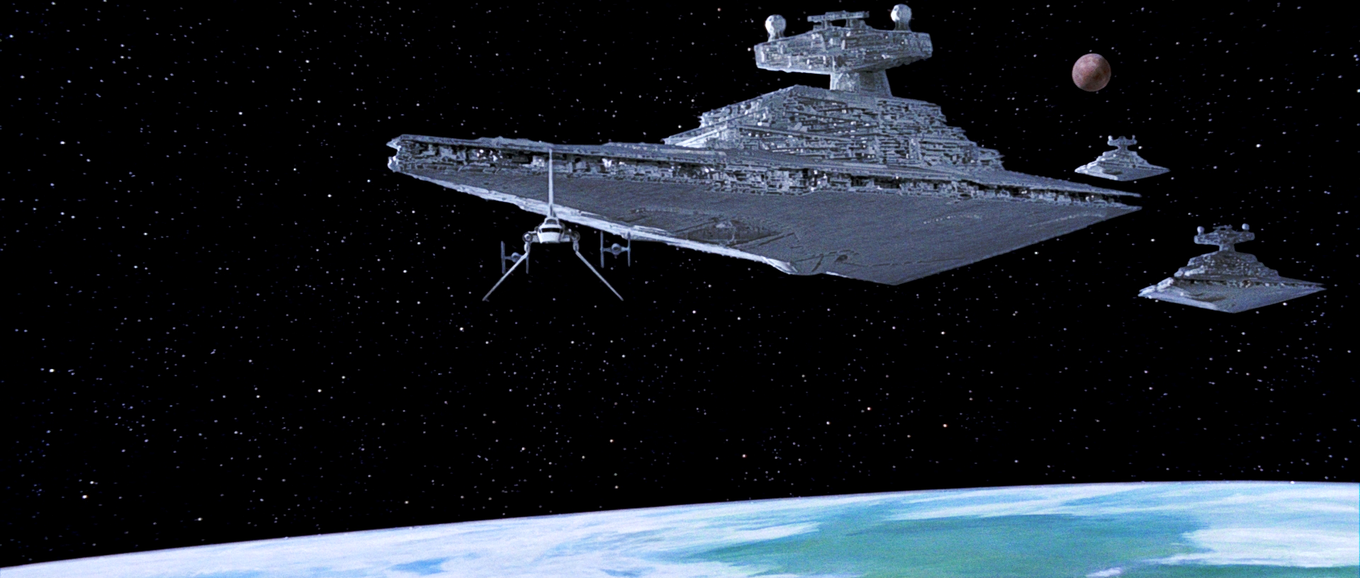 Black 11 (right) escorts ST 321 to the Death Star II battlestation.