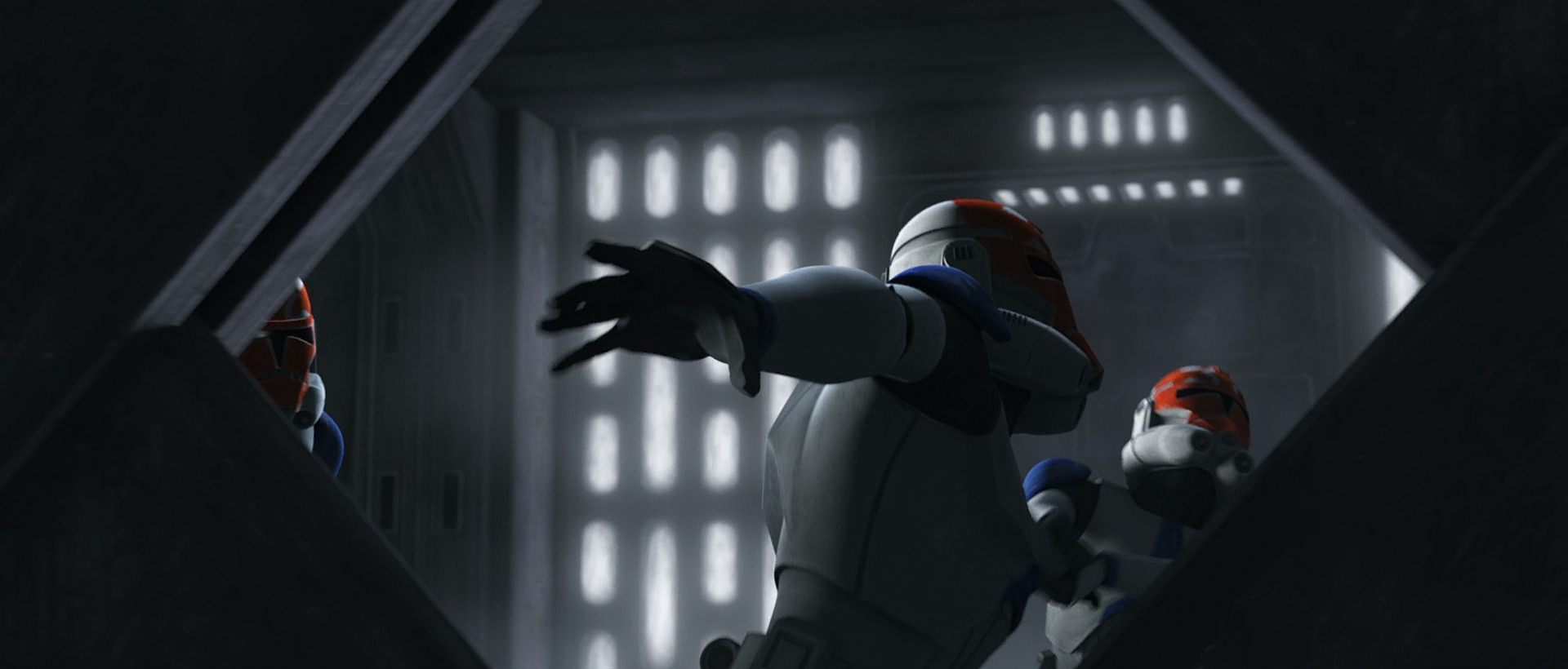 Maul pulls a clone trooper towards him to sever the soldier's arm in a closing door