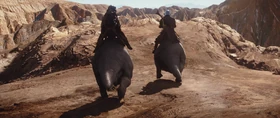 The Mandalorian and Kuiil ride the blurrgs