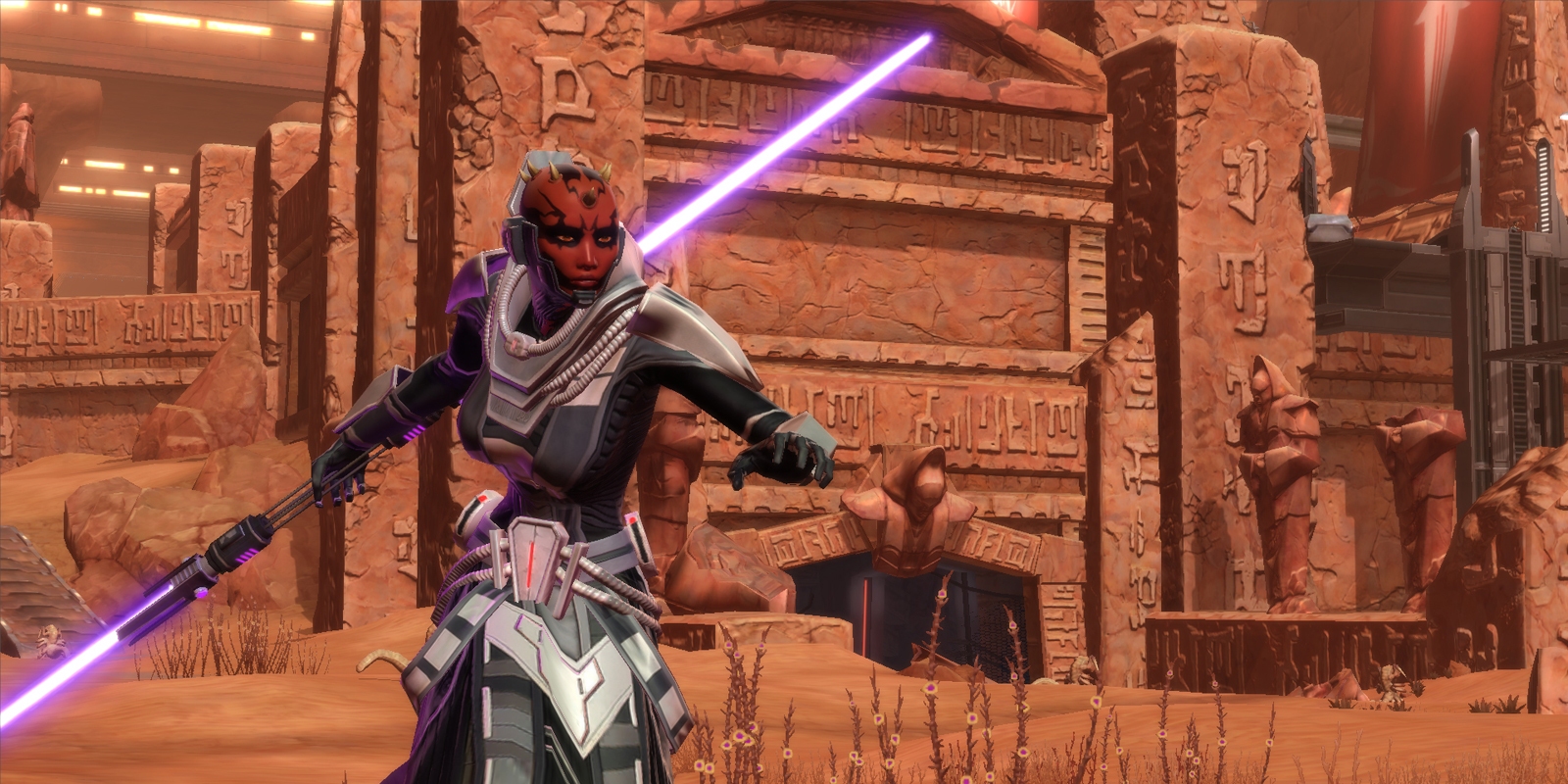 A Sith Inquisitor wielding a double-bladed lightsaber.