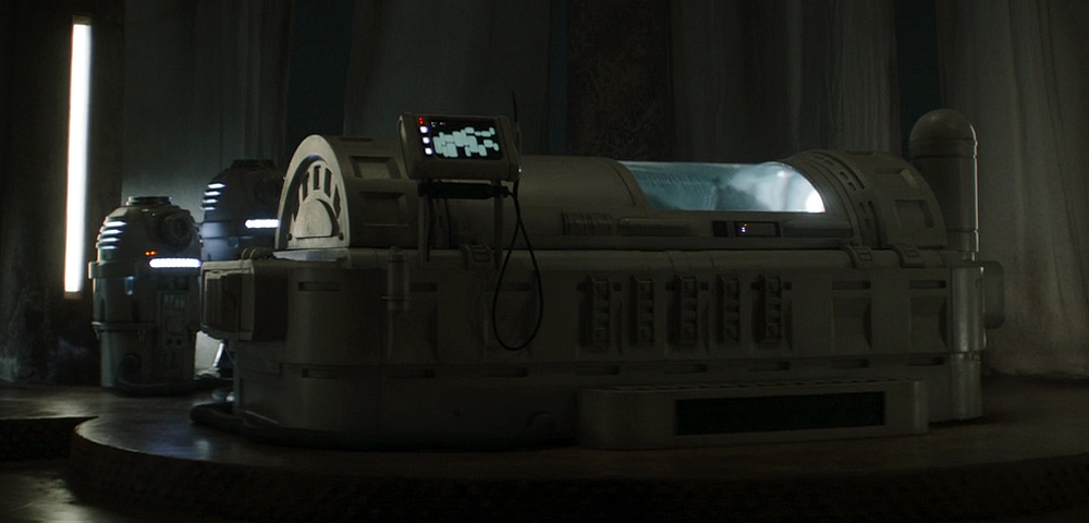 Boba Fett lies in his bacta pod