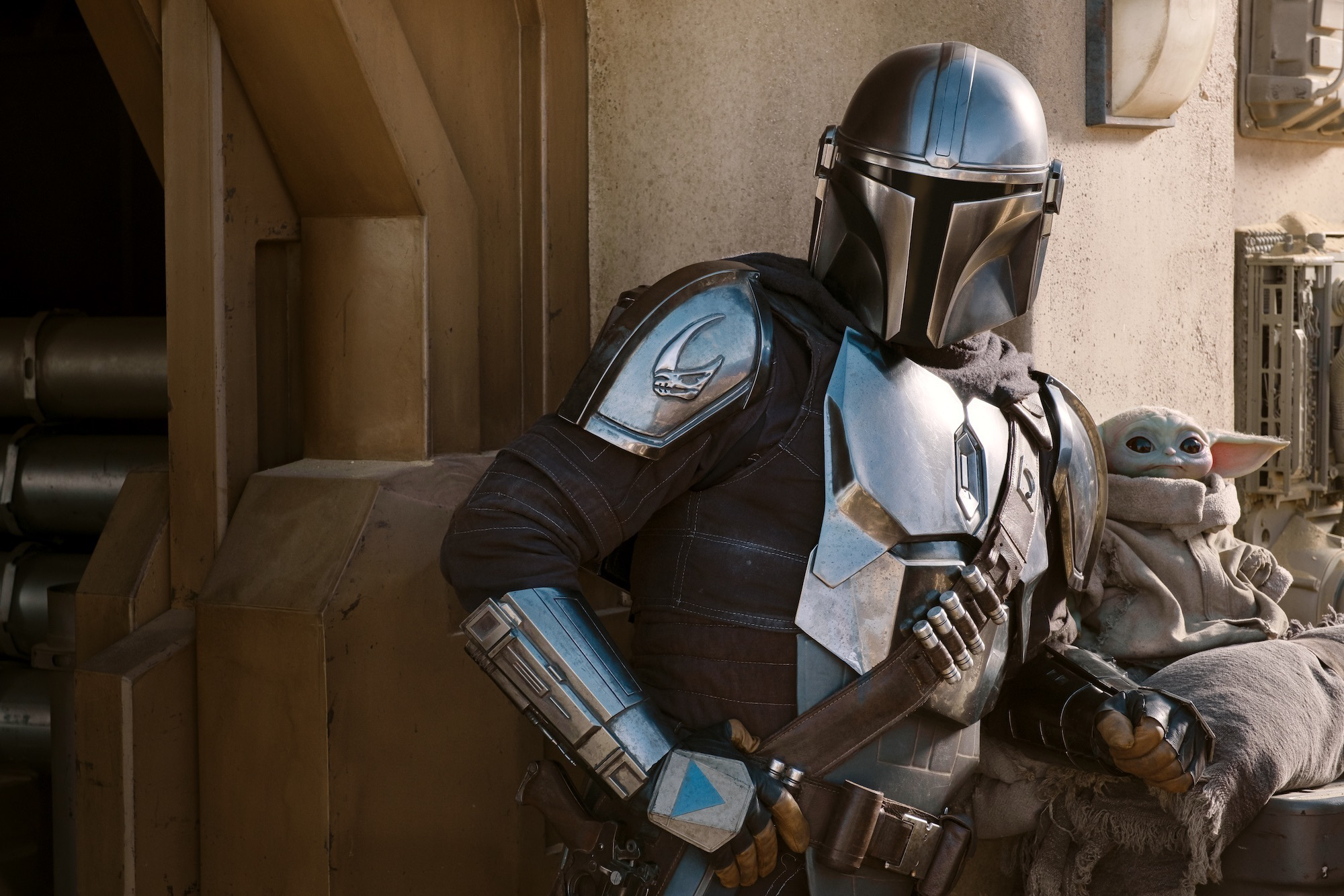 The prop for Grogu, sat next to the Mandalorian in a promotional image for Season Two.