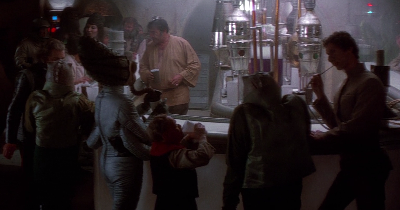 Sai'torr Kal Fas (left) and Hrchek Kal Fas (center) were patrons of Chalmun's Spaceport Cantina.