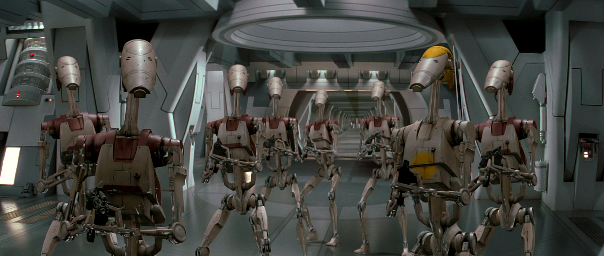 An OOM command battle droid and OOM security battle droids.