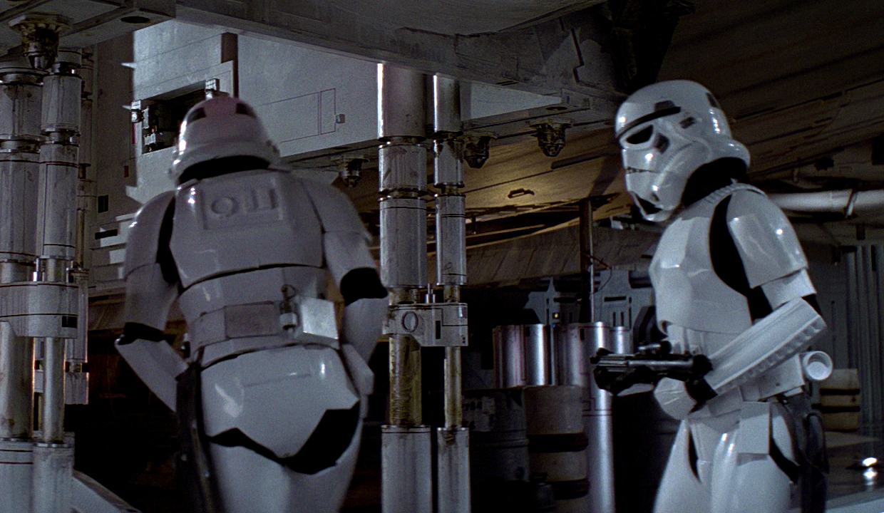 On their utility belts, TK-421 (left) carried a grappling hook but did not have a thermal detonator like TK-710 (right).