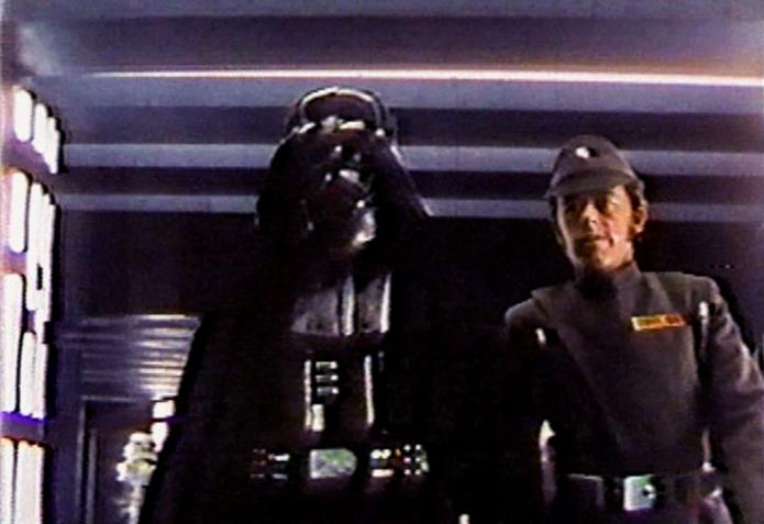 Darth Vader and an officer, discussing the Blockade of Kashyyyk.